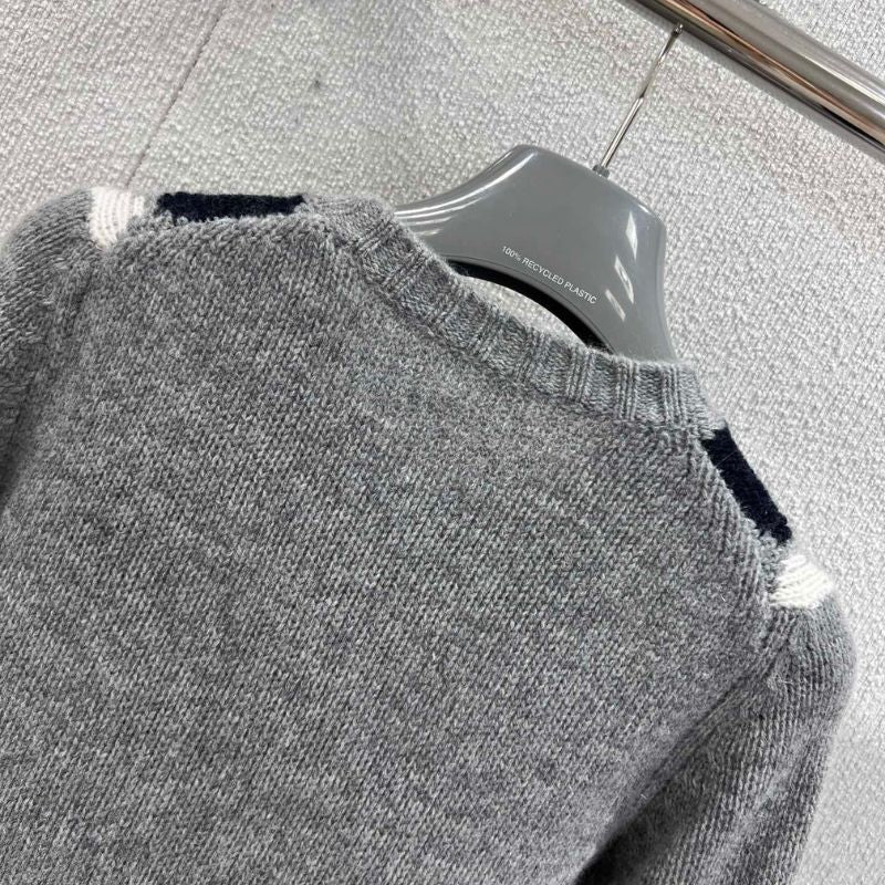 Prada Argyle knit cashmere cardigan in a gray color scheme.