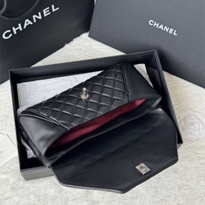 Chanel Lambskin Quilted Fold Up Again Clutch.