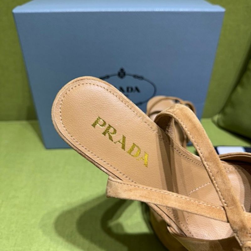 Prada Suede Platform Sandals in a warm camel/tan colorway.