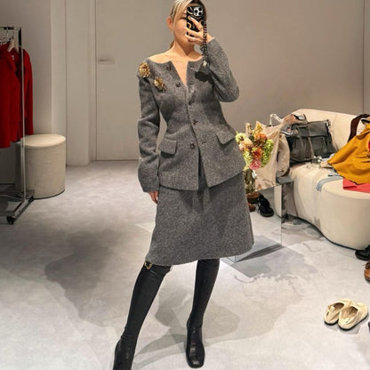 black suede knee-high boots.