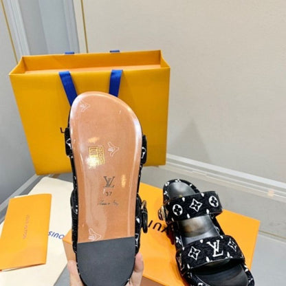 Louis Vuitton Jumbo black and white Monogram velvet Flatform Mules.