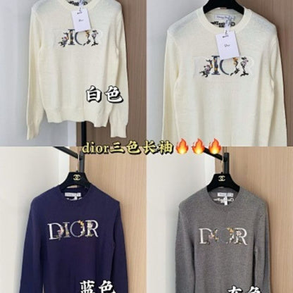 Christian Dior sweater with a distinctive large "DIOR" logo