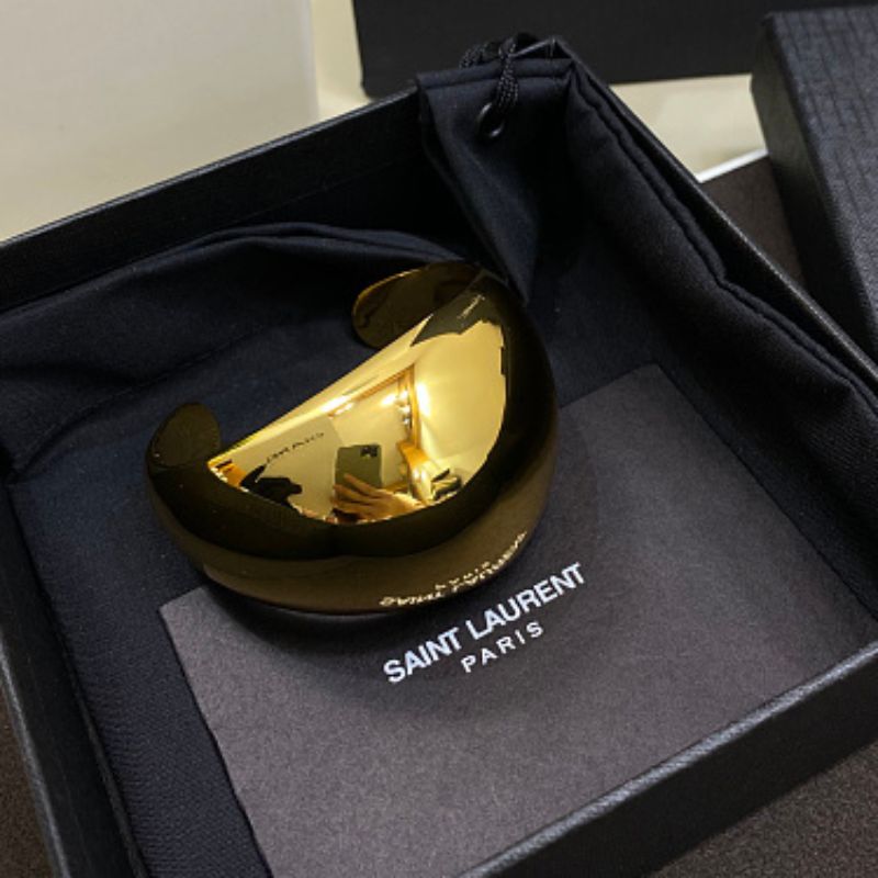 Saint Laurent Dome Cuff Bracelet in gold,