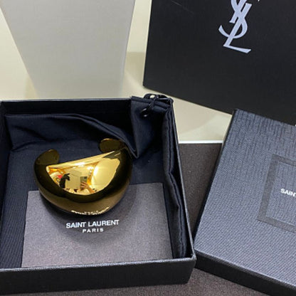 Saint Laurent Dome Cuff Bracelet in gold,