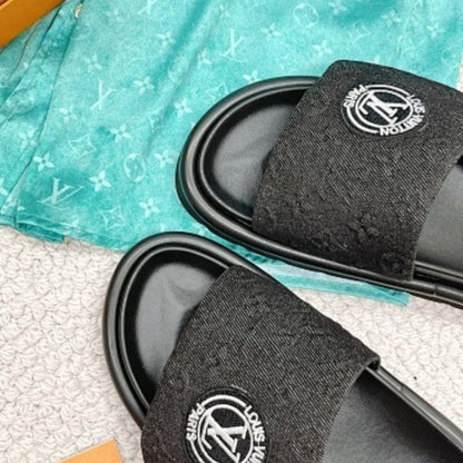Louis Vuitton Pool Pillow Flat Comfort Mules in blue Monogram denim.