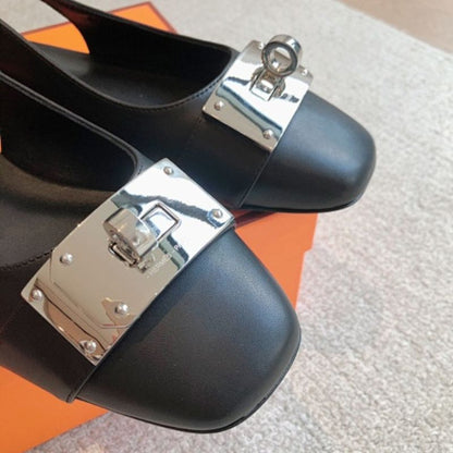 Hermès Innocente Slingback Flats in noir (black) leather,