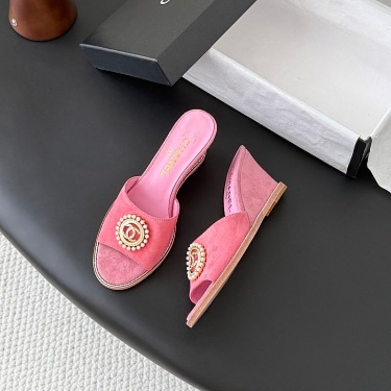 Chanel Pearl-Embellished Interlocking CC Suede Mules in bright pink.