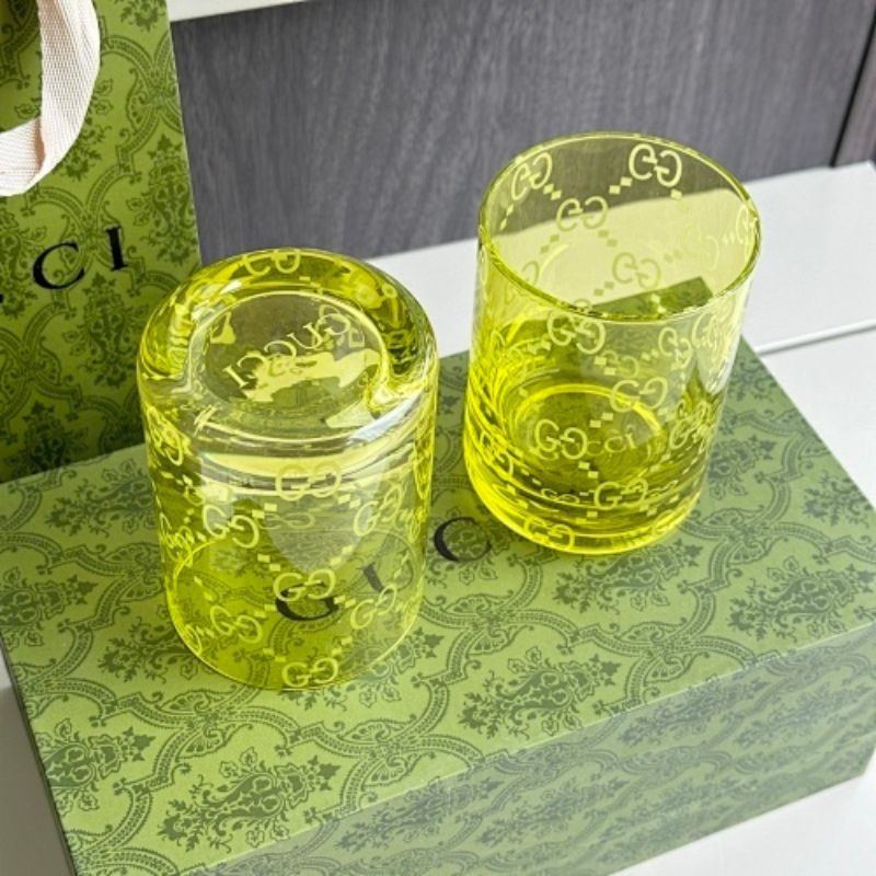 Gucci yellow-tinted crystal tumblers,