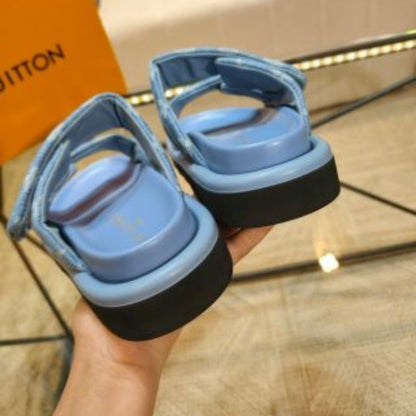 Louis Vuitton Pool Pillow Comfort Mules in blue Monogram denim.
