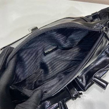 Prada Soft Lux Leather Shoulder Bag in black.