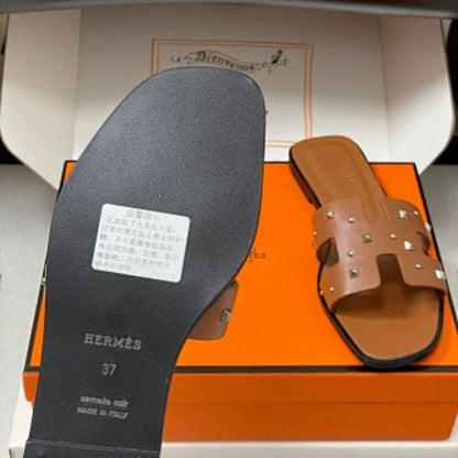 Hermès Oran sandals.
