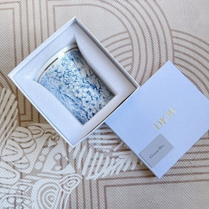 Dior Maison collection the iconic Toile de Jouy motif in blue and white.