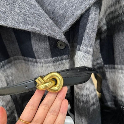 Christian Dior coat with black fur cuffs.