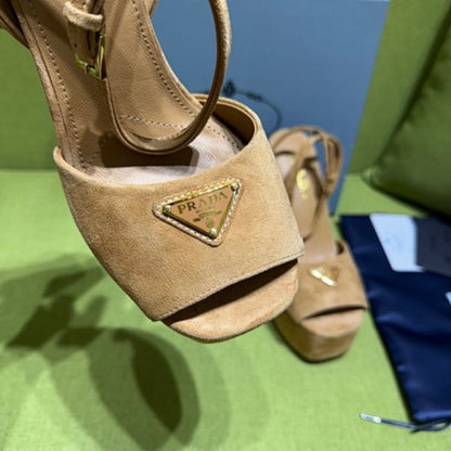 Prada Suede Platform Sandals in a warm camel/tan colorway.