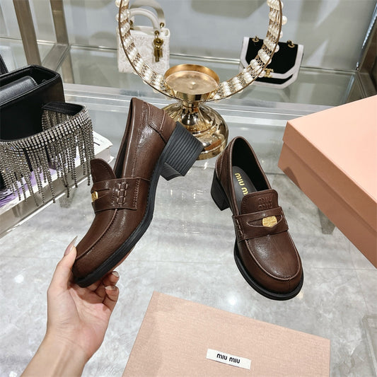 Miu Miu Decò Calf Leather Loafers.