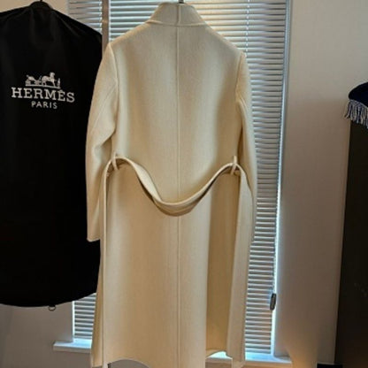 HERMES PARIS  asymmetrical wrap coat with a buckle closure