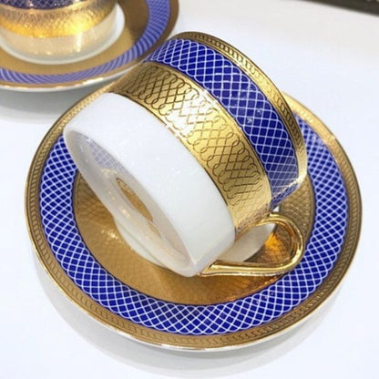 Dior royal blue and gold tea set.