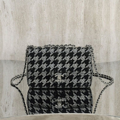 Chanel Black and Silver Diamante Crystal Houndstooth Mini Flap Bag.
