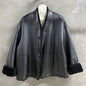 Christian Dior black double-faced leather-effect jacket with faux shearling lining and trim.