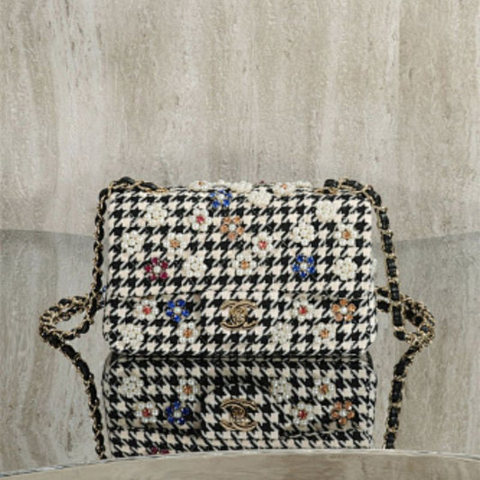 Chanel Mini Classic Handbag from the Métiers d'Art 2024 collection.