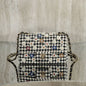 Chanel Mini Classic Handbag from the Métiers d'Art 2024 collection.