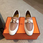 Hermès Paris Loafers in a bi-color white and clay-beige leather combination.