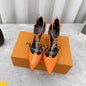 Louis Vuitton a bright orange patent leather pointed-toe pump