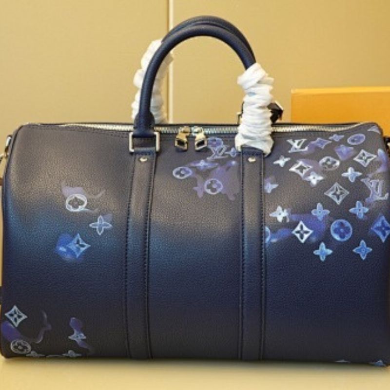 Louis Vuitton Keepall Bandoulière 50 in Monogram Ink Watercolor blue.