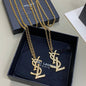 Yves Saint Laurent (YSL) monogram pendant necklaces