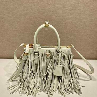 Prada Arqué Fringe Leather Handbag in a light off-white shade.