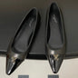 Louis Vuitton Darling Ballerinas in black.