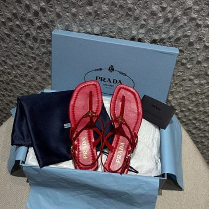 Prada Patent Leather T-Strap Enameled Triangle Logo Sandals.