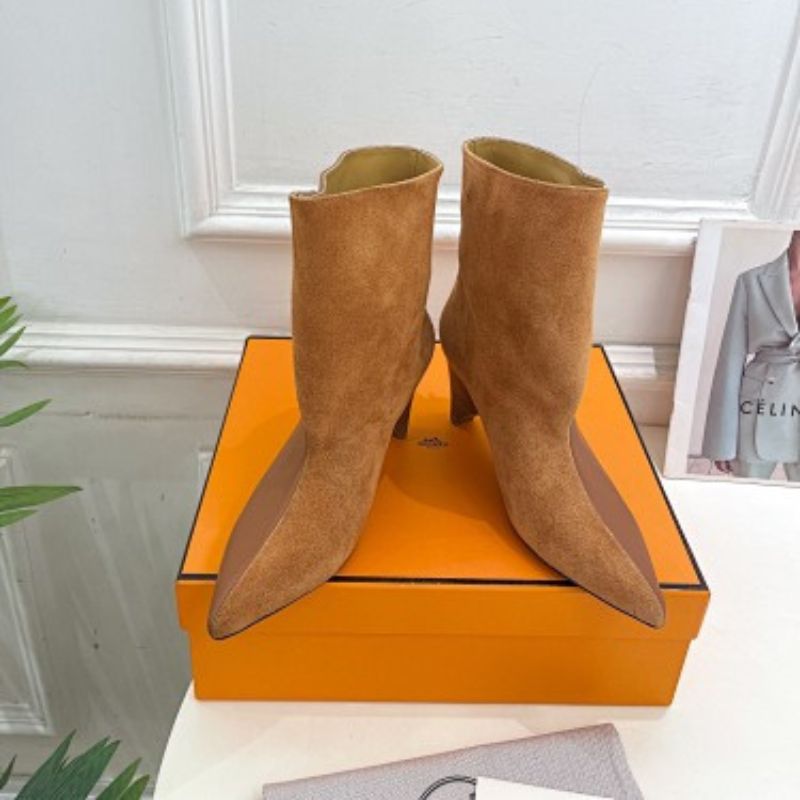 Hermès Rouxa Ankle Boots in a warm camel-brown finish.Sizes: 35-39
