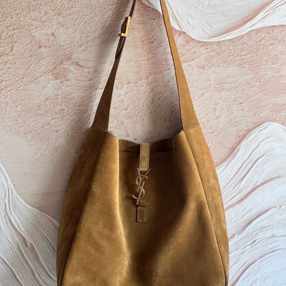 Saint Laurent Le 5 à 7 supple large suede shoulder bag.