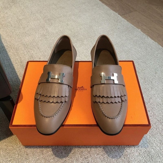 Hermès Royal Loafers in a neutral taupe/beige leather.