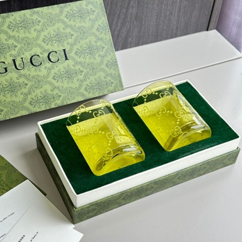 Gucci yellow-tinted crystal tumblers,