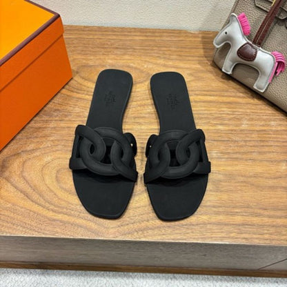 Hermès Aloha Sandals in noir (black)