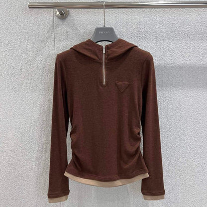 Prada quarter-zip hooded top.