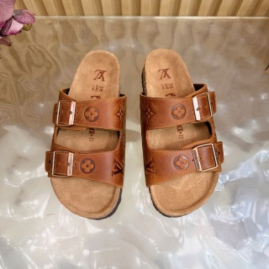 Louis Vuitton custom Birkenstock-style sandals.