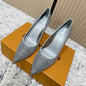 Louis Vuitton Gala Pump in grey.