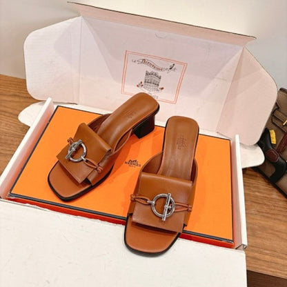 Hermès Ilot 50 Sandals in calfskin leather.