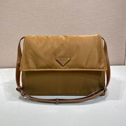 Prada Re-Nylon Large Padded Shoulder Bag in a caramel brown shade.
