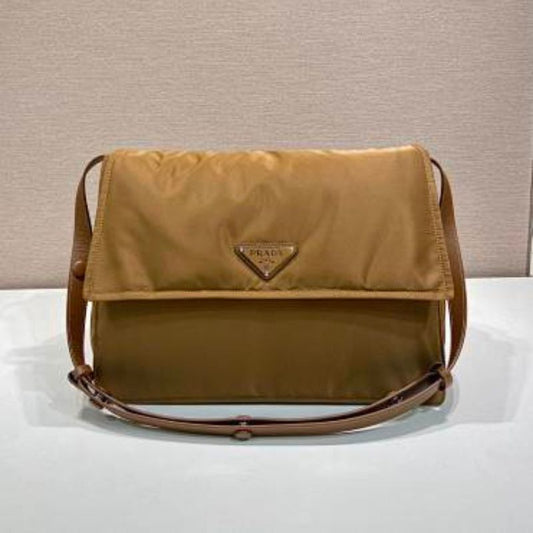 Prada Re-Nylon Large Padded Shoulder Bag in a caramel brown shade.