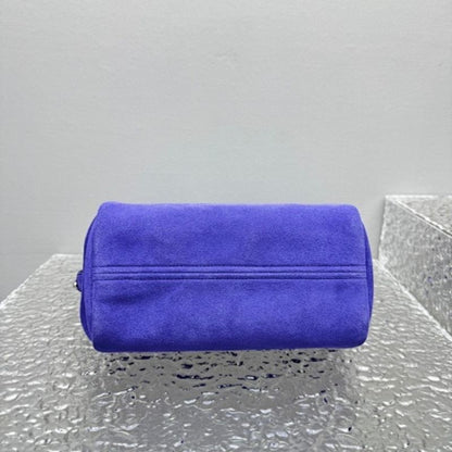Prada Arqué Suede Mini Bag in a vibrant purple shade