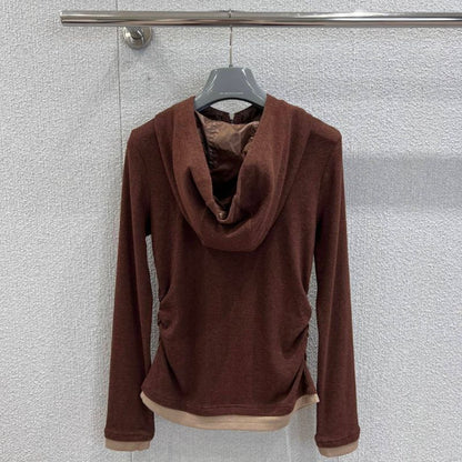 Prada quarter-zip hooded top.