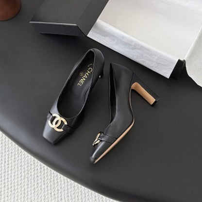 Chanel Interlocking CC Square-Toe Pumps in black (noir).