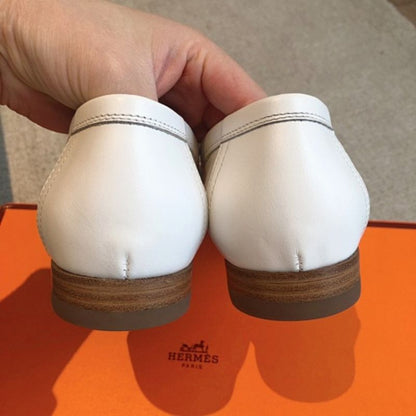 Hermès Paris Loafers in a bi-color white and clay-beige leather combination.