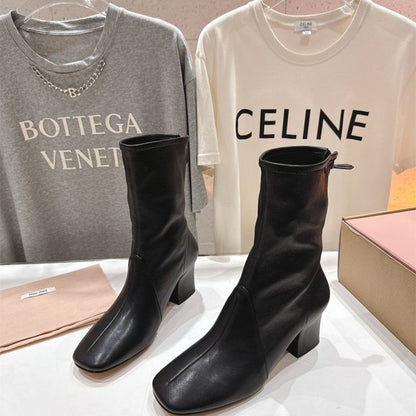 Miu Miu black leather square-toe ankle boots with a zipper closure