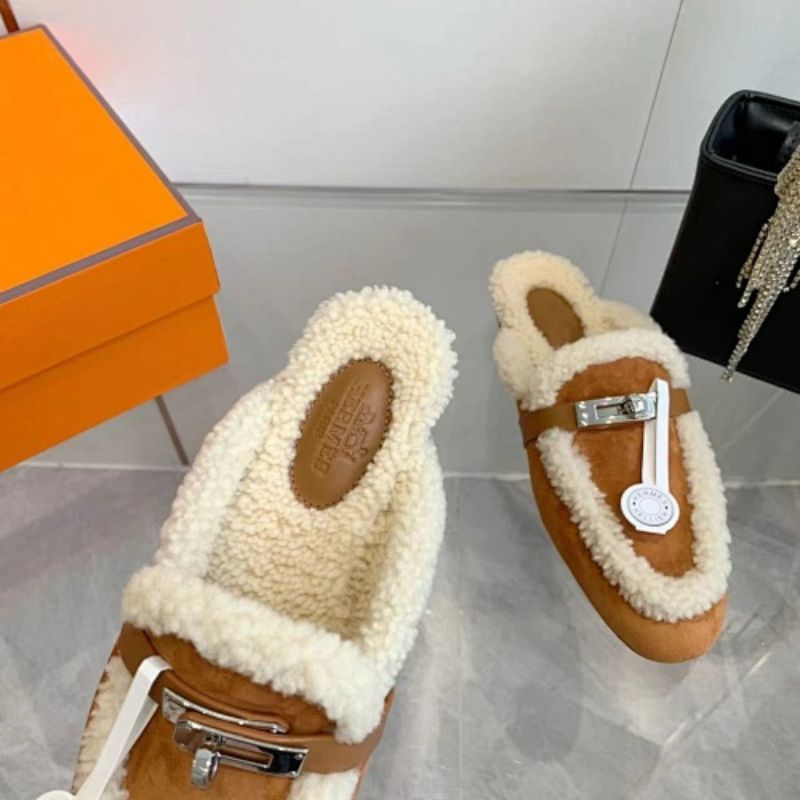 Hermès Carlotta Mules in the Gold (tan) shearling variation.