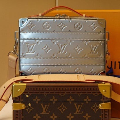 Louis Vuitton Handle Soft Trunk in Monogram Mirror coated canvas.